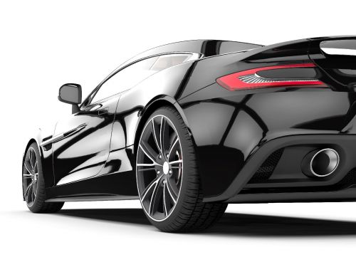 La parte posterior de un coche negro.